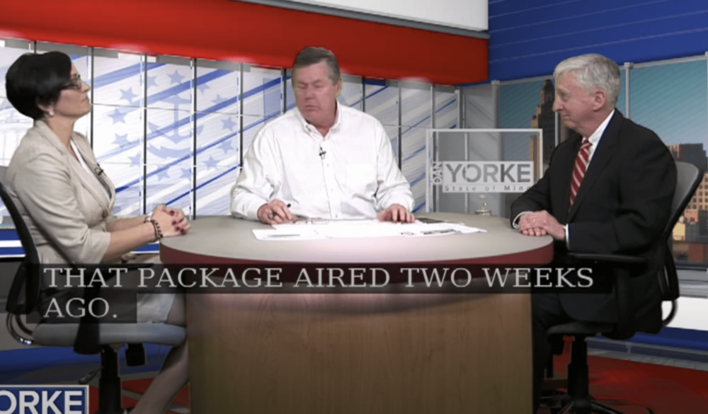 Jina Petrarca speaking to Dan Yorke at his desk on the Dan Yorke television show