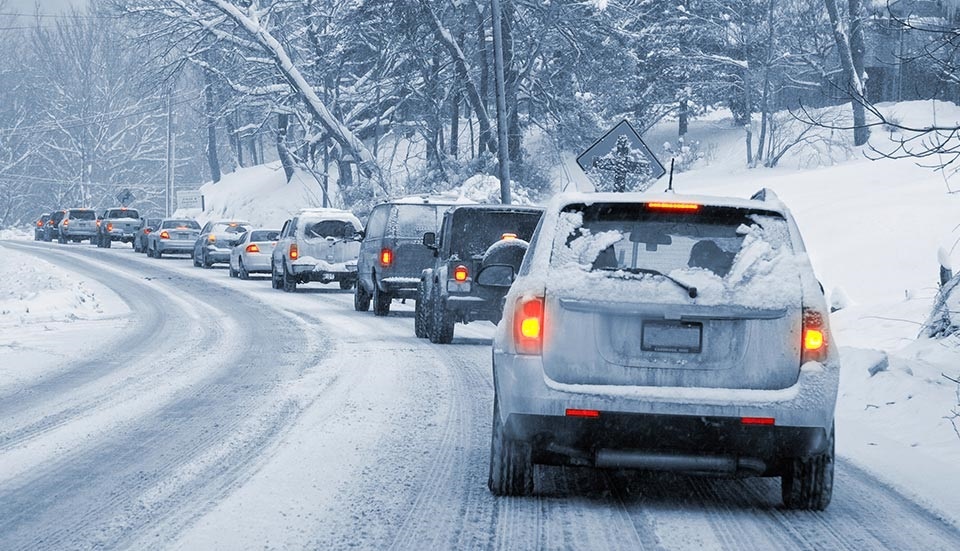 cars in traffic in rhode island during a winter storm